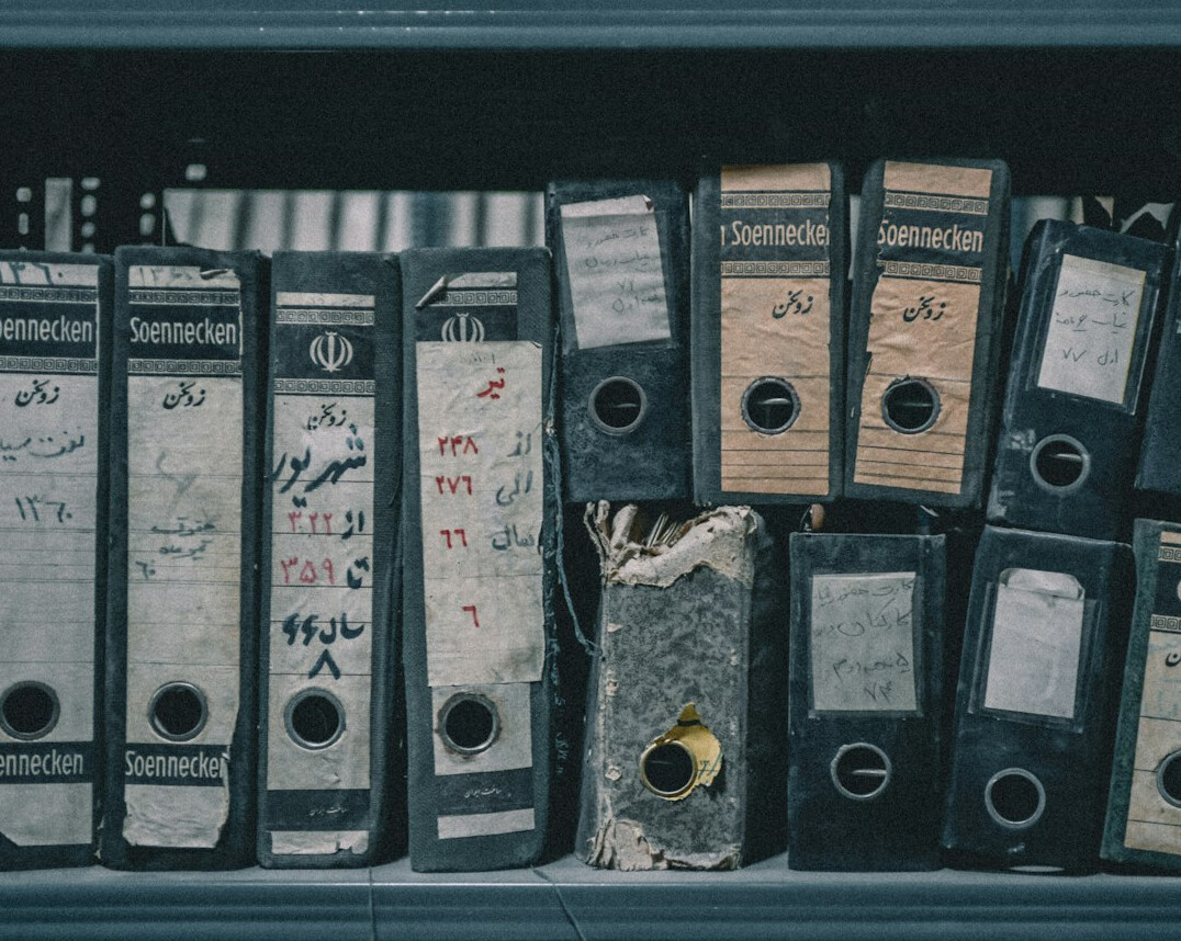detective investigating old files